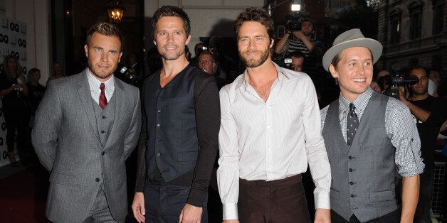 Gary Barlow, Jason Orange, Howard Donald and Mark Owen of Take That arrive at the 2009 GQ Men of the Year Awards at the Royal Opera House in Covent Garden, London