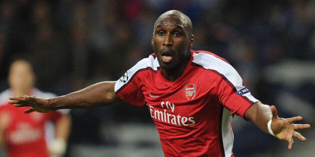Arsenal's Sol Campbell celebrates after scoring against FC Porto in a Champions League round of 16 first leg soccer match at Porto's Dragon Stadium in Porto, Portugal, Wednesday, Feb. 17, 2010. (AP Photo/Paulo Duarte)