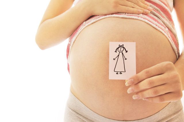 pregnant woman with stickers