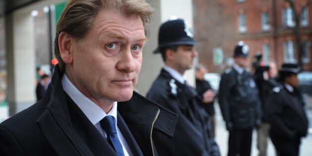 Eric Joyce MP leaves City of Westminster Magistrates Court in London today where he was spared jail for beating up four politicians while drunk and telling police "You can't touch me, I'm an MP".