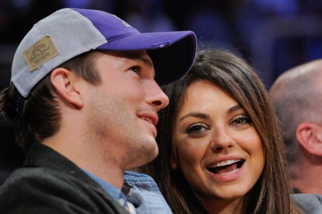 Ashton Kutcher (L) and Mila Kunis