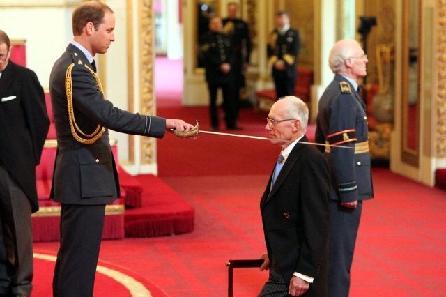 Sir Marcus Setchell from London is made a Knight Commander of the Royal Victorian Order by the Duke of Cambridge during an Investiture ceremony at Buckingham Palace in central London.