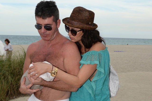 MIAMI, FL - FEBRUARY 24: Simon Cowell and Lauren Silverman enjoy Miami Beach with their son, Eric Cowell on February 24, 2014 in Miami, Florida. (Photo by Max Zorin/FilmMagic)