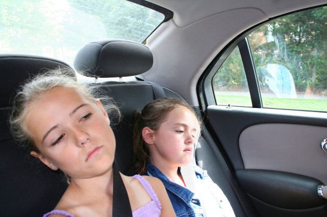 Kids bored in a car journey