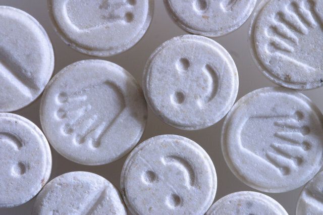 E Ecstasy pills or tablets close up studio shot methylenedioxymethamphetamine