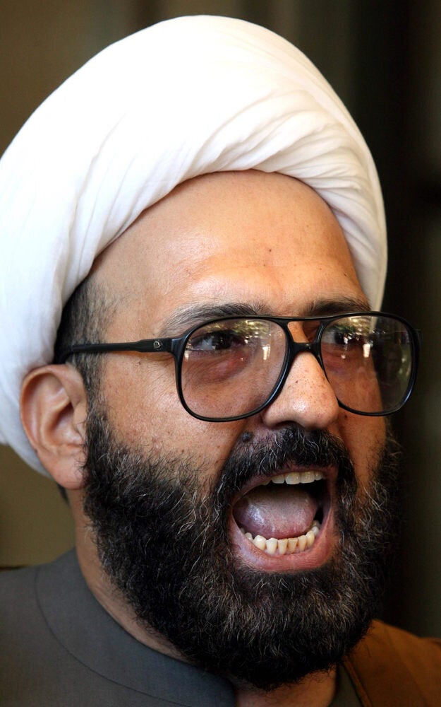 Editorial Use Only. Consent Required for Commercial Use and Book PublicationsMandatory Credit: Photo by Cameron Richardson/Newspix/REX (4301769d)Iranian born Muslim cleric, Sheik Haron, who is named in court papers as Man Haron Monis, arrives at Downi