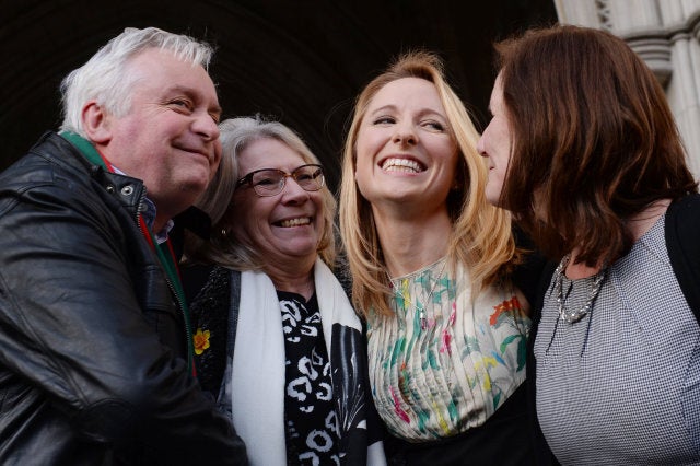 Beth Warren leaves the Law Courts in London with her mother Georgina Hyde (far right), and her in-laws, Kevin and Helen Brewer, after she won her High Court fight to preserve her late husband's sperm.