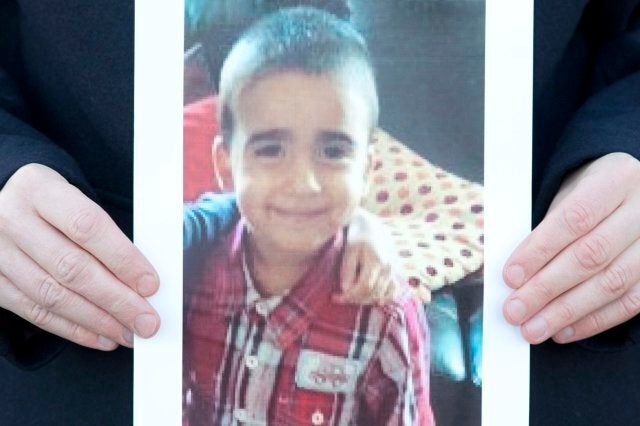 EDINBURGH, SCOTLAND - JANUARY 16: Superintendent Liz McCainsh holds a photo of missing child Mikaeel Kular, 3, near his home on January 16, 2014 in Edinburgh, Scotland. Three year old Mikaeel Kular was last seen at nine o'clock last night when he went to bed at his home in Ferry Gait Crescent, Edinburgh. Police are searching the local area and have appealed for any information. (Photo by Chris Watt/Getty Images)
