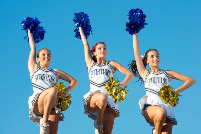 Cheerleaders posing together