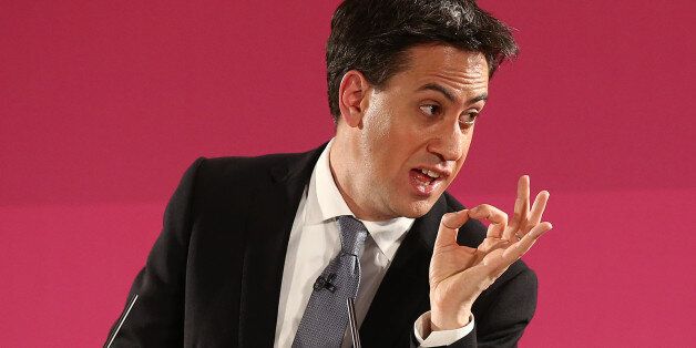 GREAT YARMOUTH, ENGLAND - DECEMBER 15: Labour party leader Ed Miliband gestures during a speech on December 15, 2014 in Great Yarmouth, England. Miliband set out plans to stop cheap foreign workers replacing British staff, stating that a Labour government would pass a law to criminalise such behaviour. (Photo by Carl Court/Getty Images)