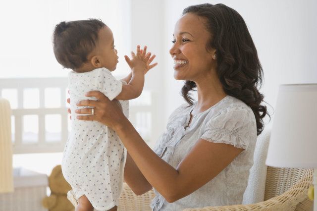 Mother smiling at baby