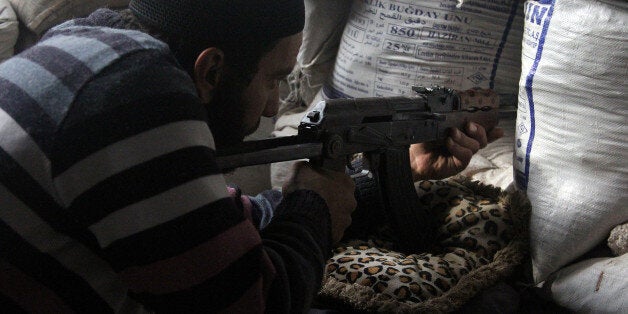 ALEPPO, SYRIA - DECEMBER 30: Damascus Front forces deploy around the Citadel of Aleppo during the clashes against regime forces in Aleppo, Syria, on December 30, 2014. Damascus Front members arrive at depot of Assad forces by the way of tunnel and at least 15 regime forces killed. (Photo by Mustafa Sultan/Anadolu Agency/Getty Images)