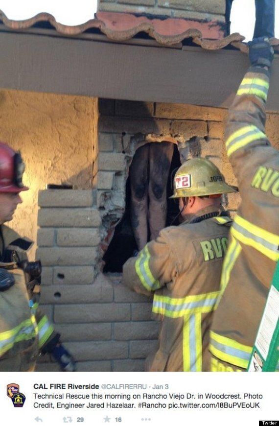 Woman Stuck In Chimney - Photo : Crews rescue naked woman 