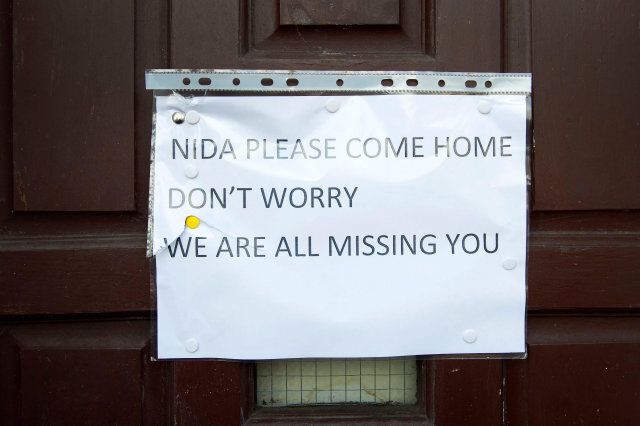 NEWPORT, WALES - January 02: A major police search is under way to find missing teenager Nida Ul-Naseer who vanished from her home on Linton Street after taking out the rubbish on December 28. Picture shows a message on the front door to the family home on January 02, 2014 in Newport, Wales. (Photo by Matthew Horwood/Alamy Live News)