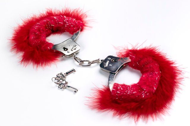 Pink locked handcuffs for adult games