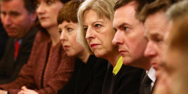 Home Secretary Theresa May and Chancellor George Osborne (centre right) at the first Cabinet meeting of 2015 at 10 Downing Street in London.