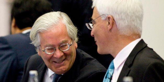 LONDON - SEPTEMBER 5: Mervyn King, governor of the Bank of England (L) and Alistair Darling, U.K. chancellor of the exchequer, share a joke as they attend the opening session of the G20 finance ministers meeting, at the Treasury in Westminster on September 5, 2009 in London, England. British PM Gordon Brown has warned against withdrawing support for the global economy too soon, stating it could undermine tentative recovery signs, during a G20 meeting. Finance ministers are in London for a two-d