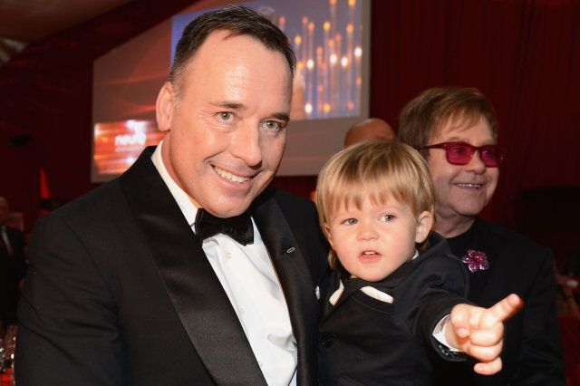 WEST HOLLYWOOD, CA - FEBRUARY 24: (L-R) David Furnish, Zachary Furnish-John and Sir Elton John attend the 21st Annual Elton John AIDS Foundation Academy Awards Viewing Party at Pacific Design Center on February 24, 2013 in West Hollywood, California. (Photo by Dimitrios Kambouris/Getty Images for EJAF)