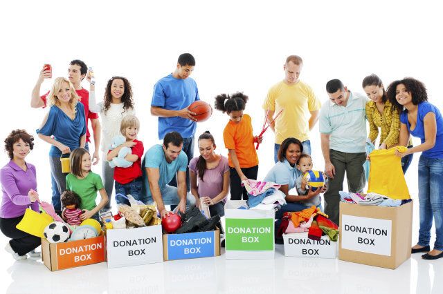 Group of people take out things from the donor box. Isolated on white background.