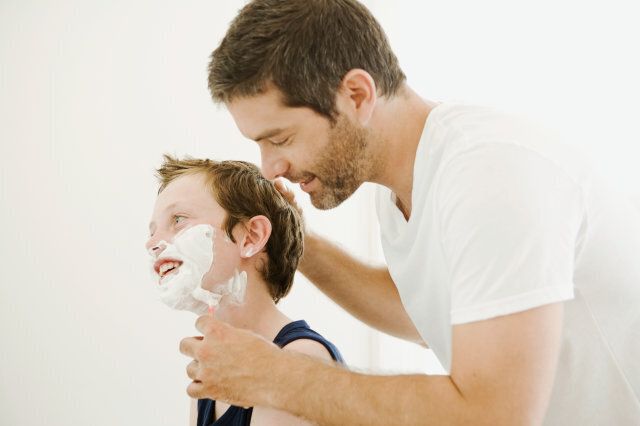 teaching how to shave.