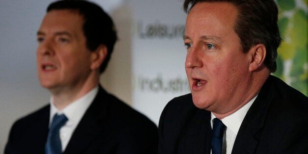 STOCKPORT, ENGLAND - JANUARY 9: Prime Minister David Cameron (R) sits with Chancellor George Osborne during a meeting with local small business owners on January 9, 2015 in Stockport, England. (Photo by Phil Noble - WPA Pool/Getty Images)