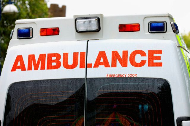 UK ambulance rear top in the rain