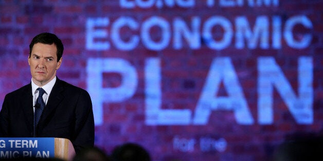 MANCHESTER, ENGLAND - JANUARY 08: Chancellor George Osborne looks on as Prime Minister David Cameron (not pictured) delivers a speech to business leaders on their long term economic plan at a conference in the Old Granada TV Studios on January 8, 2015 in Manchester, England. (Photo by Peter Byrne - WPA Pool/Getty Images)