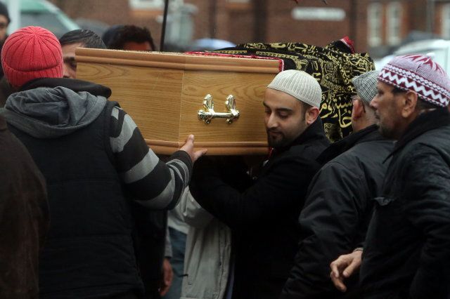 Mourners attend the funeral in High Wycombe of the members of two young brothers that were killed in a car crash on the M6 on Christmas Day.