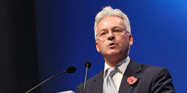 LONDON, ENGLAND - OCTOBER 31: Minister of State for International Development Alan Duncan presents at the closing ceremony of the World Islamic Economic Forum at ExCel on October 31, 2013 in London, England. (Photo by Miles Willis/Getty Images for 9th World Islamic Economic Forum)