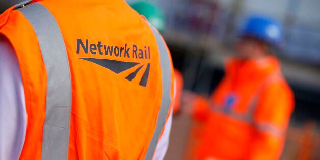 File photo dated 09/10/2013 of workers wearing Network Rail vests. A second rail workers union is holding a strike ballot after rejecting a pay offer from Network Rail.