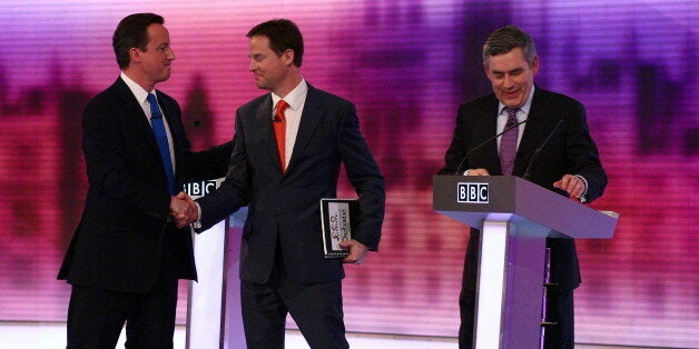 British opposition Conservative party leader, David Cameron (L), shakes hands with opposition Liberal Democrat leader, Nick Clegg (C), and Prime Minister, and leader of the ruling Labour Party, Gordon Brown (R), at the end of the live televised debate, at the University of Birmingham, in Birmingham, central England on April 29, 2010. Britain's main party leaders squared up for the final pre-election TV debate Thursday. AFP PHOTO/Gareth Fuller/Pool (Photo credit should read GARETH FULLER/AFP/G