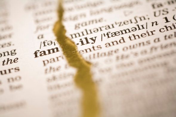 Torn dictionary page on gold background. Sepia toned. Selective focus.