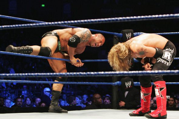 SYDNEY, AUSTRALIA - JUNE 15: Batista climbs back into the ring against World Heavyweight Champion Edge during WWE Smackdown at Acer Arena on June 15, 2008 in Sydney, Australia. (Photo by Gaye Gerard/Getty Images)