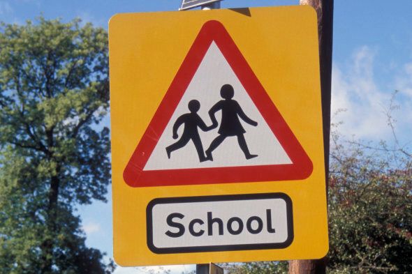 Schoolchildren road safety road sign with solar panel, Yorkshire. (Photo by: Photofusion/UIG via Getty Images)