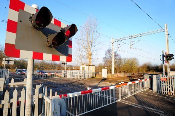 General view of level crossing at Wedgwood train station in Stoke-on-Trent, Staffordshire.