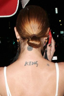 Jessie J tells haters she knows her tattoo is misspelt