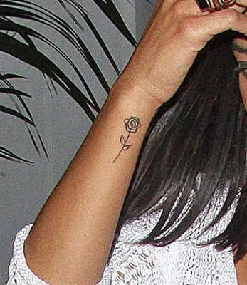 Jessie J defends misspelled tattoo blunder in saucy bikini snap