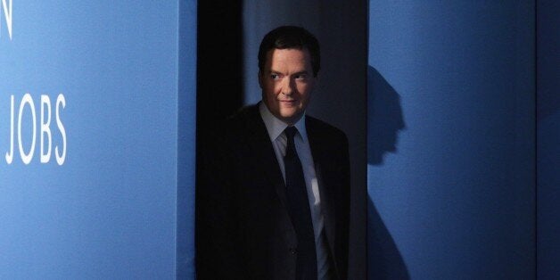 MANCHESTER, ENGLAND - SEPTEMBER 30: Chancellor of the Exchequer George Osborne arrives to deliver his speech in the main hall on the second day of the Conservative Party Conference on September 30, 2013 in Manchester, England. Chancellor of the Exchequer George Osborne has unveiled a Government plan for long-term unemployed people to undertake work placements in order to receive their benefits. (Photo by Oli Scarff/Getty Images)