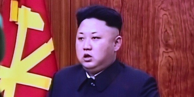 A South Korean man watches a television screen showing North Korean leader Kim Jong-Un's New Year speech, at a railroad station in Seoul on January 1, 2015. North Korean leader Kim Jong-Un said he was open to the 'highest-level' talks with South Korea as he called for an improvement in strained cross-border relations. AFP PHOTO / JUNG YEON-JE (Photo credit should read JUNG YEON-JE/AFP/Getty Images)