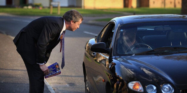 WINSLOW, ENGLAND - APRIL 08: United Kingdom Independence Party (UKIP) member Nigel Farage talks to a voter in a car on April 8, 2010 in Winslow, England. UKIP Member of the European Parliament, Nigel Farage, is standing in the constituency of Parliament's speaker John Bercow in the general election which is to be held on May 6, 2010. Electoral convention dictates that main political parties do not put up candidates in the current Speaker�s constituency. (Photo by Peter Macdiarmid/Getty I