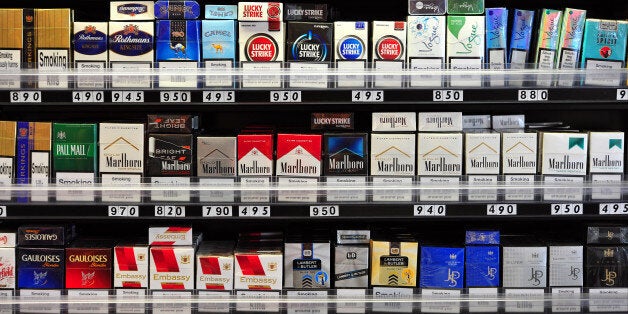 Packets of cigarettes are pictured in a shop in central London on July 12, 2013. Britain announced it had postponed plans to introduce plain packaging on cigarettes, saying it was waiting to see the results of a similar move in Australia. AFP PHOTO/CARL COURT (Photo credit should read CARL COURT/AFP/Getty Images)