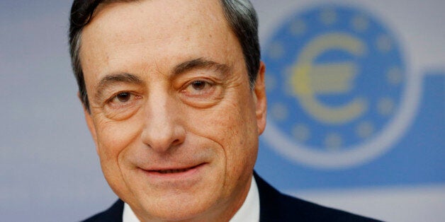 President of European Central Bank Mario Draghi, attends a news conference in Frankfurt, Germany, Thursday, Nov. 6, 2014, following a meeting of the ECB governing council. European Central Bank head Mario Draghi opened the door for further stimulus saying the bank staff is preparing the technical groundwork for further support measures if needed for the struggling economy. Stocks rallied and the euro slumped on the news. The ECB did not announce further monetary support after its governing counc