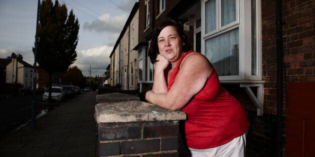 In this photo provided by Channel 4 on Tuesday, Jan. 21, 2013, 'White Dee' featured in the show Benefits Street, poses for a promotional still. The stars of Britainâs most talked-about television show have a dubious claim to fame: They donât work. A shoplifter running away from police, a recovering drug addict and a ragtag band of jobless people are the unlikely stars of âBenefits Street,â a hit documentary-style program about welfare receipients that has drawn millions of v