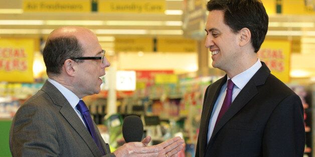Labour leader Ed Miliband speaks with BBC News political editor Nick Robinson during a visit to Morrisons supermarket in Camden, north London.