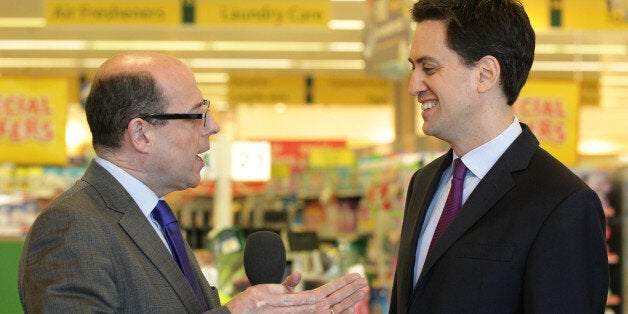 Labour leader Ed Miliband speaks with BBC News political editor Nick Robinson during a visit to Morrisons supermarket in Camden, north London.