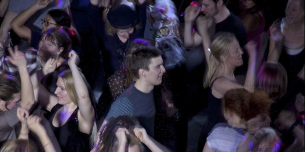 In this photo taken Tuesday March 20, 2012, people dance during the Lunch Beat event at a cultural center in central Stockholm. Lunch Beat events are held monthly in Stockholm to crowds of hundreds where organizers say the party starts at noon and goes on for one hour. There is no alcohol, which means there's a different ambiance compared to nighttime clubbing. (AP Photo/Kirsten Thyberg Eddyson)