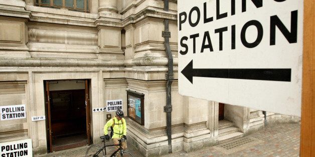 A voter leaves the polling station at the Methodist Central Hall in Westminster, central London, shortly after voting started across the UK in the General Election.