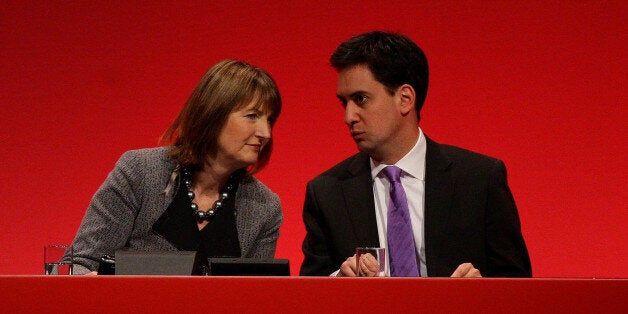 New Labour party leader Ed Miliband and deputy leader Harriet Harman on stage during the opening of the Labour Party Conference, Manchester.