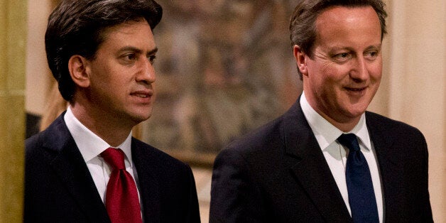 LONDON, ENGLAND - JUNE 04: (L-R) Leader of the Labour Party Ed Miliband and British Prime Minister David Cameron walk through the Central Lobby after listening to the Queen's Speech at the State Opening of Parliament on June 4, 2014 in London, England. Queen Elizabeth II will unveil the coalition government's legislative programme in a speech delivered to Members of Parliament and Peers in The House of Lords. Proposed legislation is expected to be introduced on a 5p charge for plastic bags in