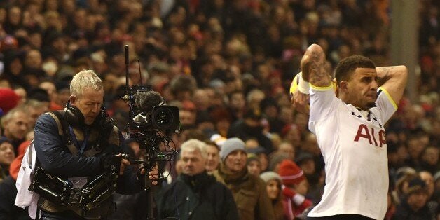 A TV cameraman films as a throw in is taken during the English Premier League football match between Liverpool and Tottenham Hotspur at the Anfield stadium in Liverpool, northwest England, on February 10, 2015. England's Premier League announced February 10, 2015 a record new domestic television rights deal worth over 5 billion GBP (7.6 billion USD) after a ferocious bidding war for the 2016-2019 period. AFP PHOTO / PAUL ELLISRESTRICTED TO EDITORIAL USE. No use with unauthorized audio, video, d